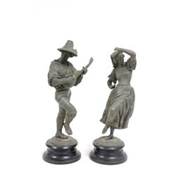 Pair white metal figures on base