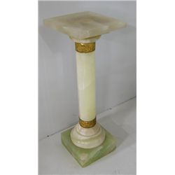 Onyx pedestal with bronze bands