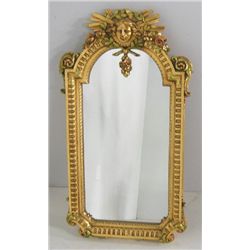 Figural gilt mirror
