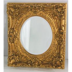 Gilt framed composition mirror