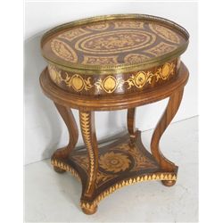 Oval inlaid side table with gallery