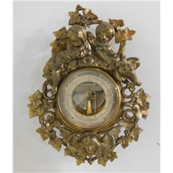 "Cherub" bronze barometer with "Foliate" design