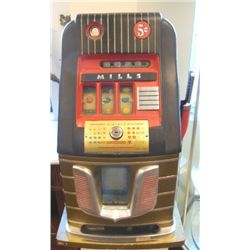 "Mills" one arm bandit machine