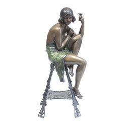 Bronze figure of "A Woman in Chair"