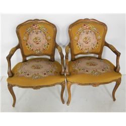 Pair Louis XV style carved walnut fauteuils