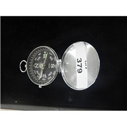 COMPASS WITH COVER