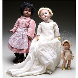 LOT OF TWO GERMAN BISQUE DOLLS AND ONE AMERICAN COMPOSITION DOLL.