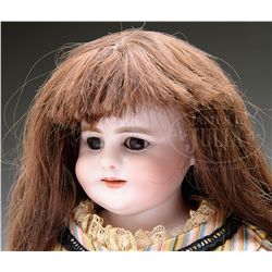GERMAN BISQUE SHOULDER HEAD DOLL.