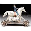 Image 1 : EARLY AMERICAN TWO FIGURED TIN PLATFORM TOY.