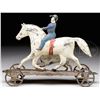 Image 2 : EARLY AMERICAN TWO FIGURED TIN PLATFORM TOY.