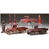 Image 1 : THREE CAST IRON TRUCKS AND GAS PUMPS.