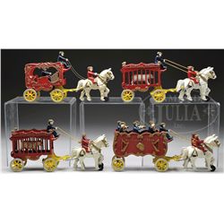 LOT OF FOUR CAST IRON CIRCUS WAGONS.