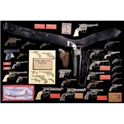 COLLECTION OF 27 CAP GUNS AND ACCESSORIES.