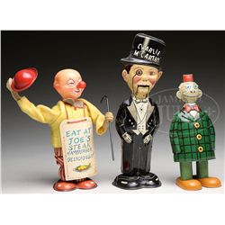 LOT OF THREE TIN WINDUP WALKING FIGURES.