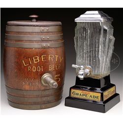 LOT OF TWO SODA FOUNTAIN DISPENSERS FOR LIBERTY ROOT BEER AND HOWEL'S GRAPE-ADE.