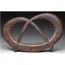 19TH CENTURY CARVED WOOD PRETZEL TRADE SIGN.