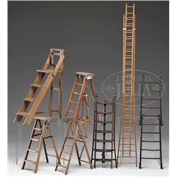 LOT OF 7 SALESMAN SAMPLE LADDERS.