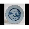 Image 1 : An 18th Century Delft Plate, the scalloped edge centred by a figured  fishing in underglaze blue,...