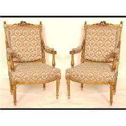 A Pair of French Carved Giltwood Fauteuils, with upholstered backs,  seats and arms, on tapering...