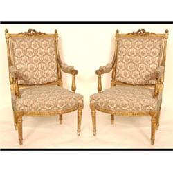 A Pair of French Carved Giltwood Fauteuils, with upholstered backs,  seats and arms, on tapering...