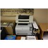 Image 2 : CONTENTS OF SHIPPING AREA INCLUDING: THREE WHITE BOARDS, TWO DESKS, TWO PRINTERS, HP ALL-IN-ONE,