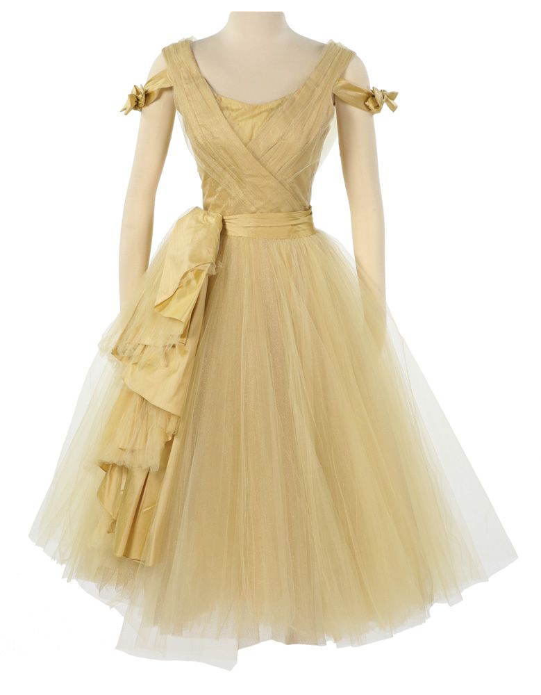 katniss everdeen gold dress All Of Jennifer Lawrence's Hunger Games Premiere Looks