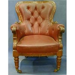 A fine pair of William IV Mahogany show frame library chairs upholstered in red buttoned rexine,...
