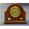 Image 1 : An Edwardian 8 day striking mantel clock contained in an arched shaped inlaid mahogany case, the...