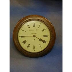 A 19th Century wall clock the 10" circular painted dial marked Salsbury & Sons Guildford, contain...