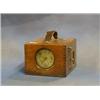 Image 1 : A racing pigeon clock contained in an oak case £30-50...