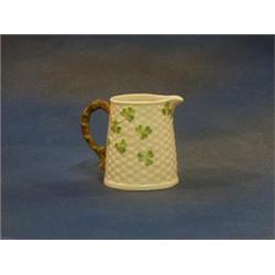 A Beleek jug the base with black mark and RD No. 0851 4" £30-50...