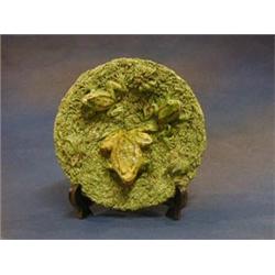 A circular Portuguese Majolica pottery plate decorated 3 frogs, the base impressed Jose A Cunha a...