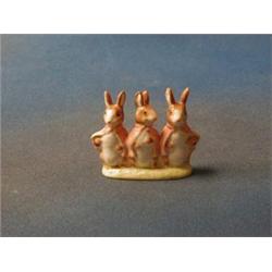 A Beswick pottery figure group "Flopsy Mopsy and Cottontail" £30-50...