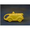 Image 1 : A Sadler yellow glazed pottery teapot in the form of a racing car (2 slight chips to rim) £30-50...