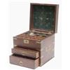 Image 1 : An early 19th century mahogany and brass mounted apothecary's cabinet with hinged top enclosing f...