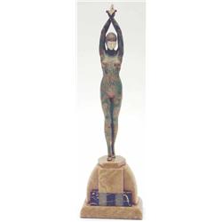 A Chiparus bronze Starfish Girl with ivory face and hands and wearing a close fitting green cold...