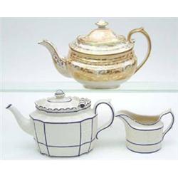 An early 19th century Castleford-type porcelain teapot with hinged cover, a near matching milk ju...
