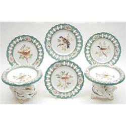 A good early Victorian bone china dessert service consisting of two comports, each modelled with...