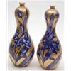 Image 1 : A pair of T.Forrester & Sons double gourd vases, floral painted in blue against a gilded ground,...