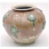 Image 1 : An ochre and green glazed ovoid jar, the rounded sides moulded in relief with green glazed foliat...