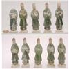 Image 1 : A set of 10 green glazed figures of attendants, each standing holding different objects including...