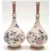 Image 1 : A pair of Royal Worcester Patent Metallic bottle vases, well painted with blue tits amongst pink...