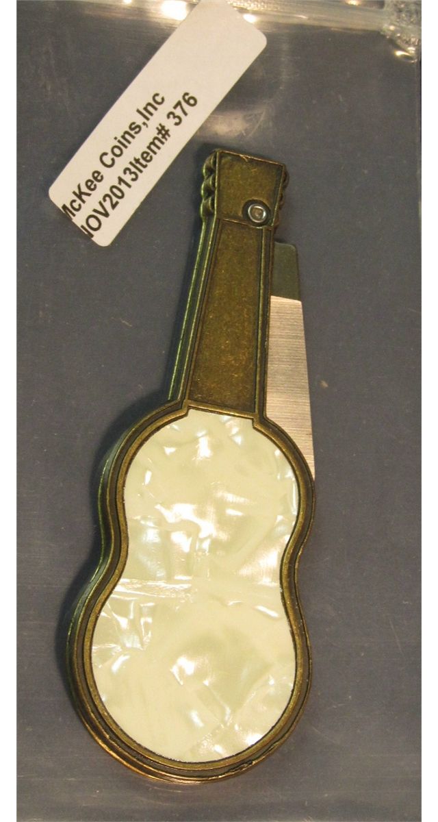 376. Colonial brand novelty knife Elvis Presley 19351977 on faux