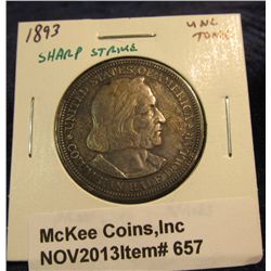 657. 1893 Columbian Exposition Commemorative Half Dollar. Darkly toned Unc.