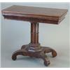 Image 1 : A Regency rosewood tea table with rounded rectangular top, on cluster column stem with saltire pl...