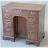 Image 1 : A George III mahogany kneehole desk with frieze drawer and 6 short drawers flanking a recessed cu...