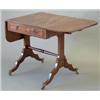 Image 1 : A small Regency mahogany sofa table with ebony stringing, D shaped flaps and 2 frieze drawers, on...