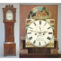An early 19th century banded mahogany 8-day longcase clock, the painted arched dial decorated wit...