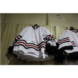 APPROX. 20 WHITE HOCKEY JERSEYS