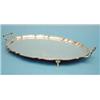 Image 1 : A plated oval 2 handled tray with serpentine rim and pad feet, 20ins. £60-80...